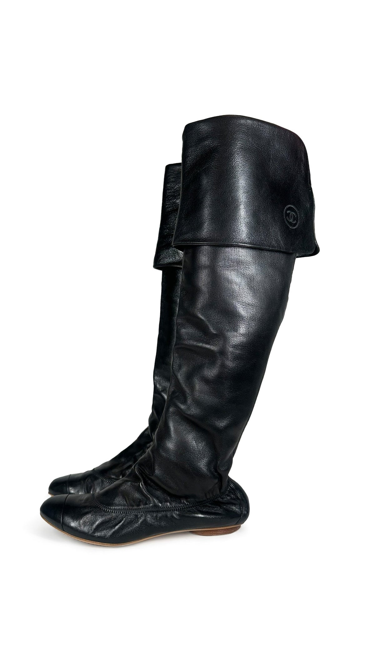 CHANEL INTERLOCKING CC LOGO CALFSKIN RIDING BOOTS  | Norma Kamali Women